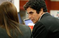 Illusionist David Copperfield appears in Las Vegas court on Tuesday. A Nevada jury got a rare behind-the-scenes look at a David Copperfield disappearing act after a British man claimed he was badly hurt as he participated in a 2013 show.