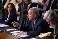 Sen. Richard J. Durbin, D-Ill., flanked by Sen. Kamala Harris, D-Calif., left, and Sen. Sheldon Whitehouse, D-R.I., questions witnesses as the Senate Judiciary Committee holds a hearing on the Trump administration’s policies on immigration enforcement and family reunification efforts, on Capitol Hill this morning.