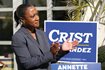 Laphonza Butler, president of EMILY’s List, listens during a rally held by the Latino Victory Fund, Oct. 20, 2022, in Coral Gables, Fla. California Gov. Gavin Newsom named Butler to the Senate seat of the late Dianne Feinstein, who died Thursday.