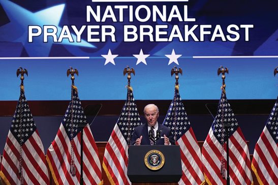 President Joe Biden speaks at the National Prayer Breakfast Feb. 3, 2022. The breakfast is one of the most visible and long-standing events that brings religion and politics together in Washington. But due to concerns the gathering had become too divisive, it's splitting from the private religious group that had overseen it for decades. The organizer and host for this year’s breakfast Thursday will be a new foundation headed by former Sen. Mark Pryor of Arkansas.