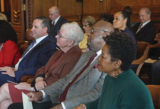Illinois Supreme Court Justices David K. Overstreet, left, Mary Jane Theis, P. Scott Neville Jr. and Lisa Holder White attend the opening of the court’s new learning center.