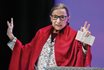 Supreme Court Justice Ruth Bader Ginsburg gestures to students before speaking at Amherst College in Amherst, Mass., in 2019. Ginsburg is being remembered during ceremonies at the Supreme Court on Friday.