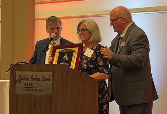 Peter Mierzwa, president of Law Bulletin Media, from left, Ann Kramer and Illinois Press Association CEO Don Craven mark the first year of the Michael B. Kramer Legislative Service Award.