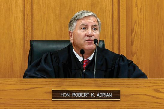 Judge Robert Adrian presides over court in Adams County, Illinois, in 2020. Adrian, who found an 18-year-old man guilty of sexual assaulting a 16-year-old girl, was reassigned from criminal to small claims court in the 8th Judicial Circuit after throwing out the conviction this month, saying the 148 days the man spent in jail was punishment enough.